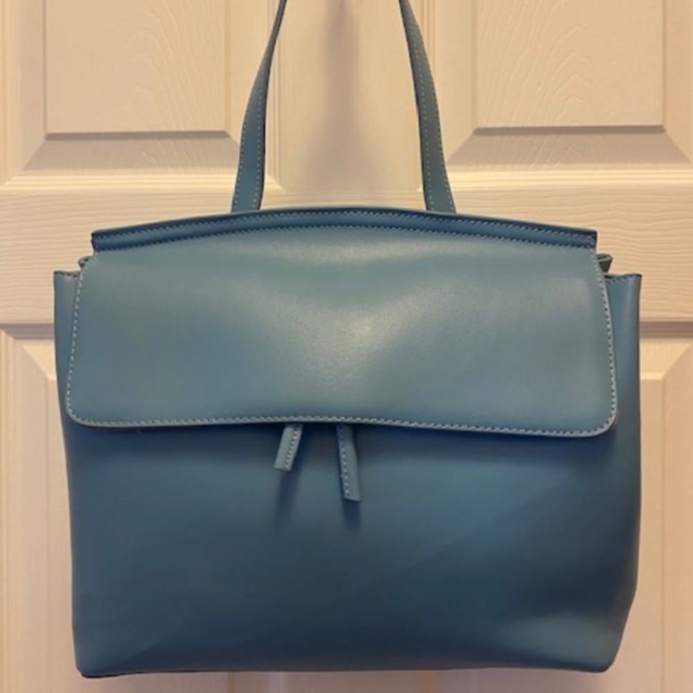 En Muir Light Blue Handbag with Gold Tone Hardware